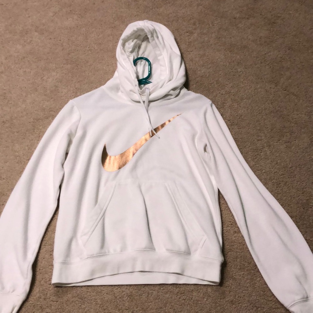 A white nike sweatshirt.